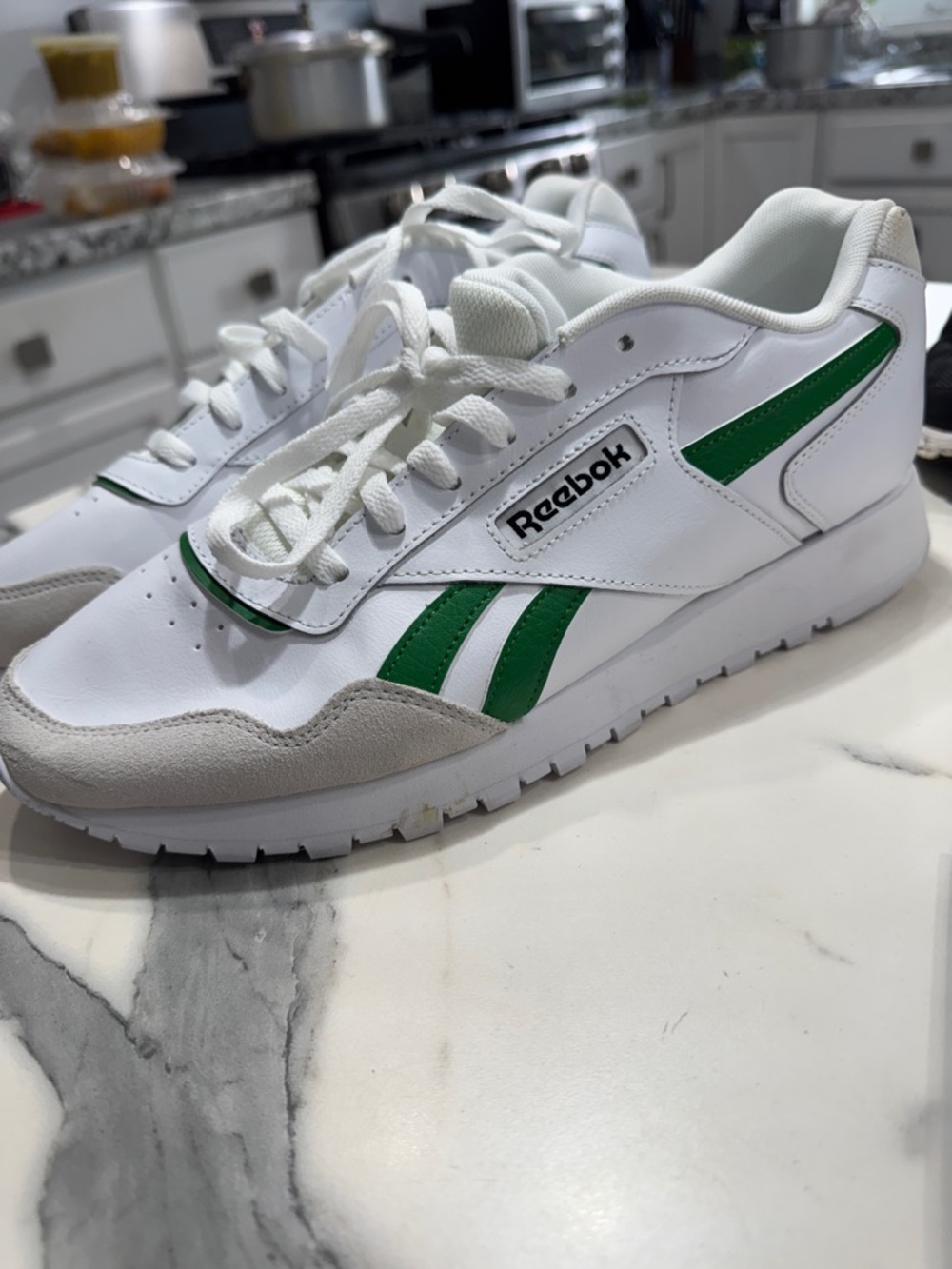 Reebok White Sneakers with Green Stripes